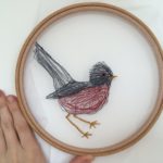 Embroidery of a Dartford warbler.