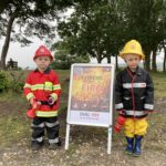 Photograph of two young boys dressed as fire fighters!