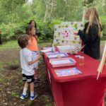 Warden Zoe getting a couple of attentive children started on the scavenger hunt