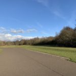 Photo of large open space, with tarmac track