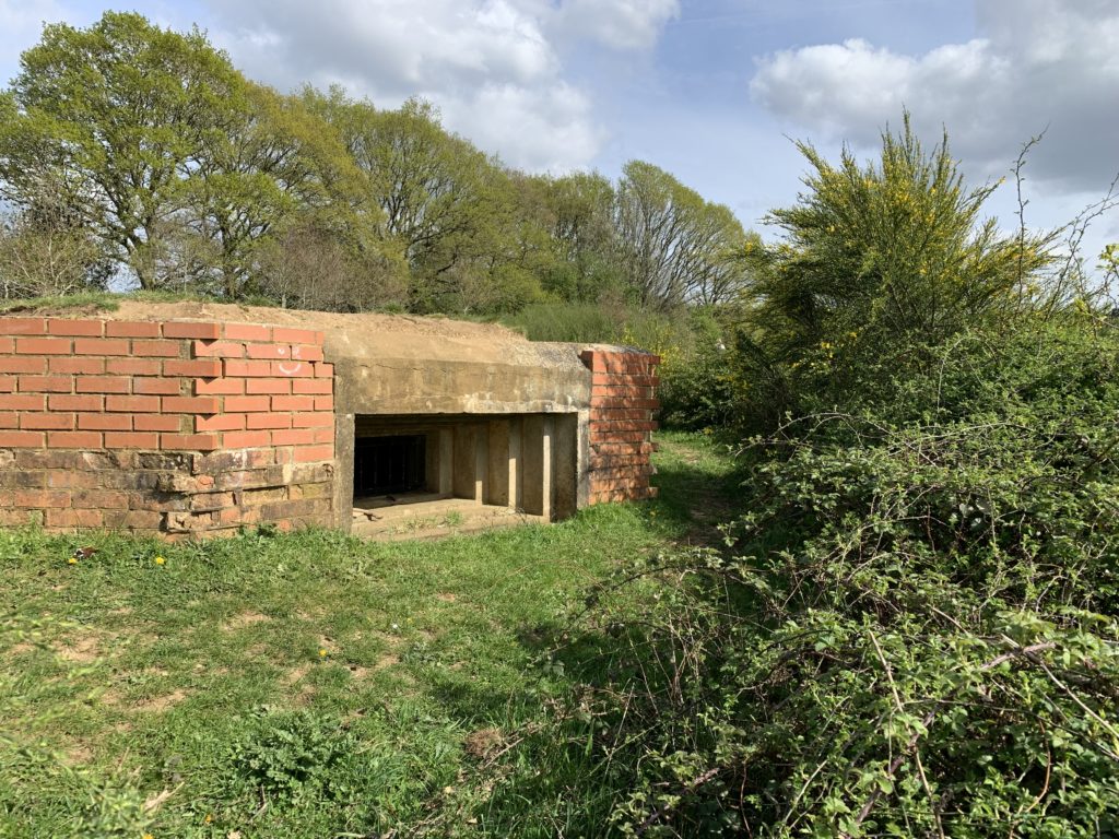 Photo of a hilltop pillbox.