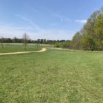 Photo of a large open space, criss-crossed by paths