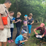 Photo of a group with Michael on a shady heathland path