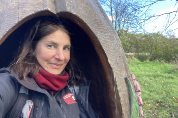Photo of Warden Nicky in a wooden pod at Bramshot Farm.
