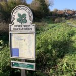 Photo of a National Trust sign naming the "River Wey Navigations"