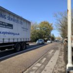 Photo of busy traffic cross a bridge over the River Wey