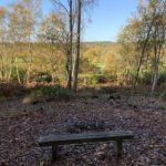 Photograph of a bench overlooking the view over Queenswood Golf Course.