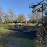 Photo of a colourful children's playground.