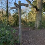 Photo of a finger post pointing to the "Ramblers Route" and "Pig Little via footpaths".