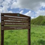Photo of Wokingham Borough Council's sign welcoming you to Keephatch Meadows.