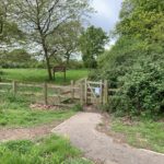 Photo of a a pedestrain gateway into the meadow.