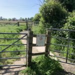 Photo of a couple of gates, that are the entrance to the fields.