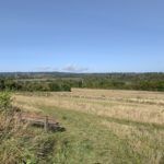 Photo taken on a hillside, looking out over the surrounding countryside.