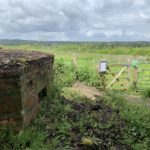 Photo of a hilltop pillbox.