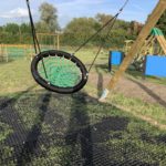 Photo of a children's swing seat.