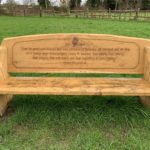 Photo of a new bench to commemorate Queen Elizabeth II. A quote from her says "Over the years I have observed that some attributes of leadership are universal and are often about finding ways of encouraging people to combine their efforts, their talents, their insights, their enthusiasm and their inspiration to work together."